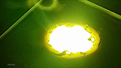 Leonardo Facchini working with lunar regolith simulant